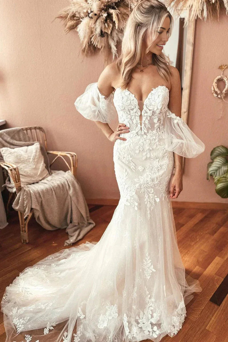 Vestidos de novia de encaje con escote corazón y apliques de sirena